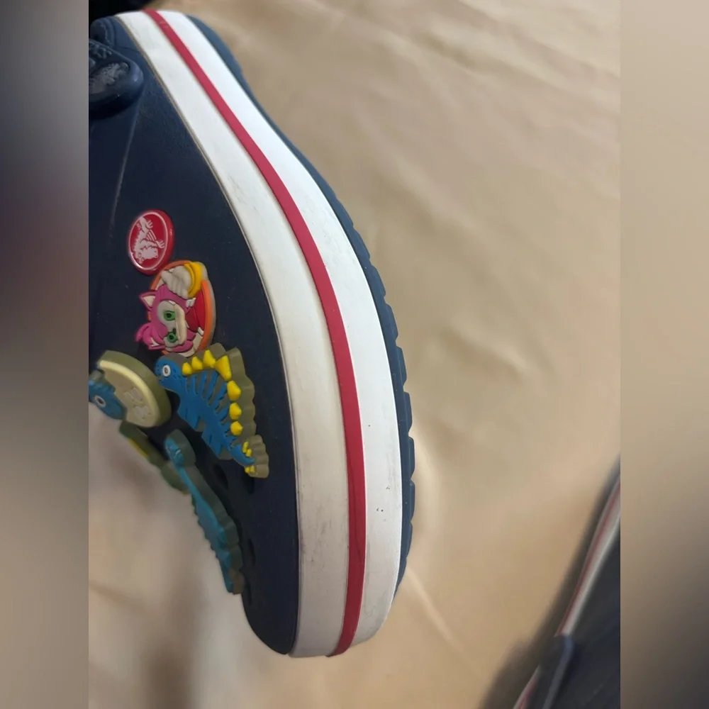 CROCS Kids Navy Clogs with‎ Dinosaur Charms
